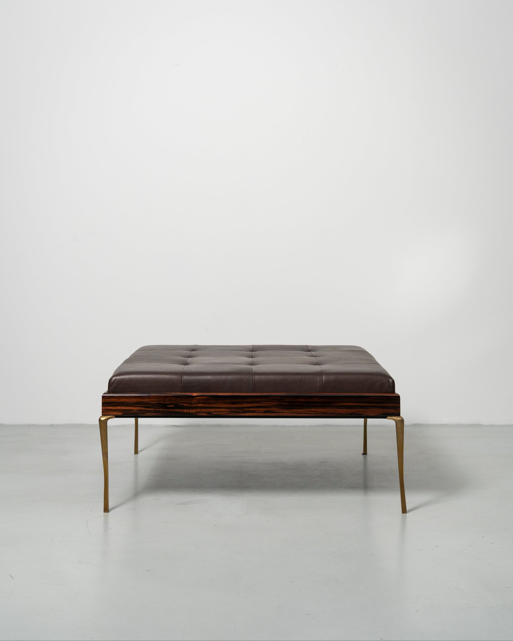 Copenhagen Ottoman by Tom Nybroe, Scandinavian design, Brown leather ottoman with wooden frame and brass legs 