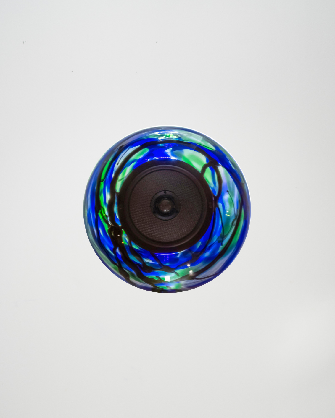 Glass Ball Spare sculptural audio design mouth-blown glass sphere with light and the speaker driver built in 

