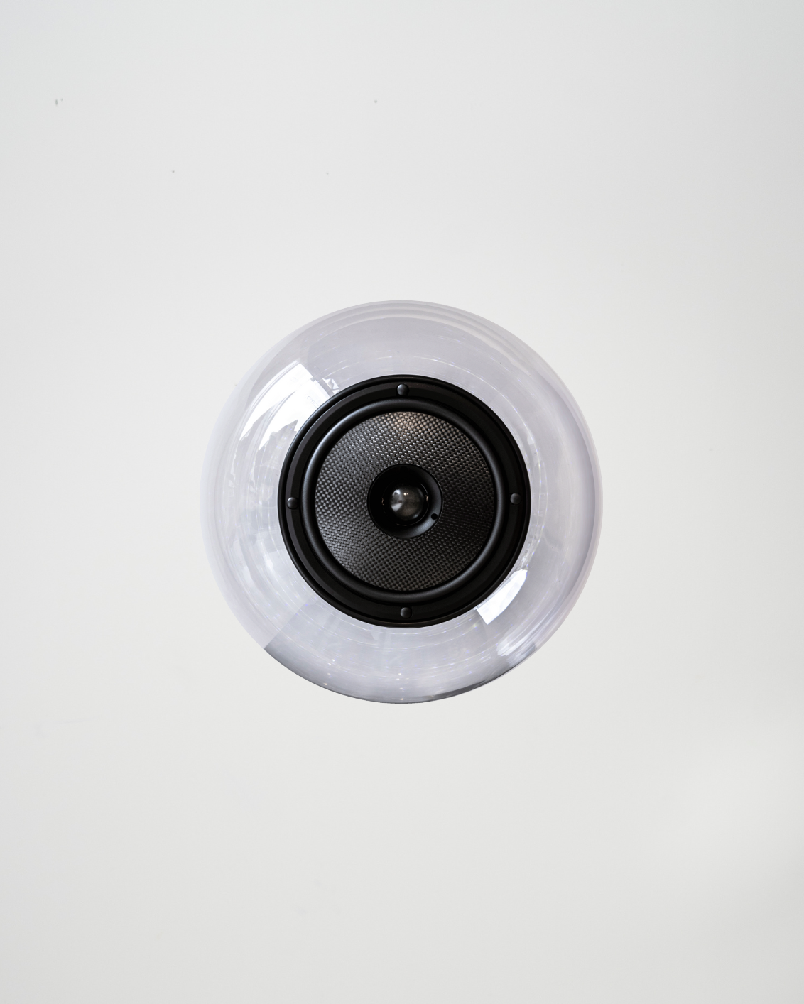 Glass Ball Spare sculptural audio design mouth-blown glass sphere with light and the speaker driver built in 
